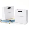 white paper bags with handles