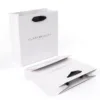 white paper bags with handles