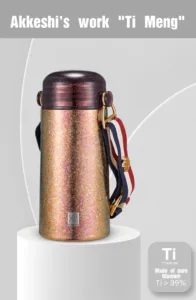Portable titanium thermos bottle