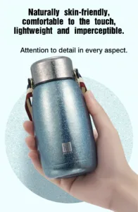 Portable titanium thermos bottle