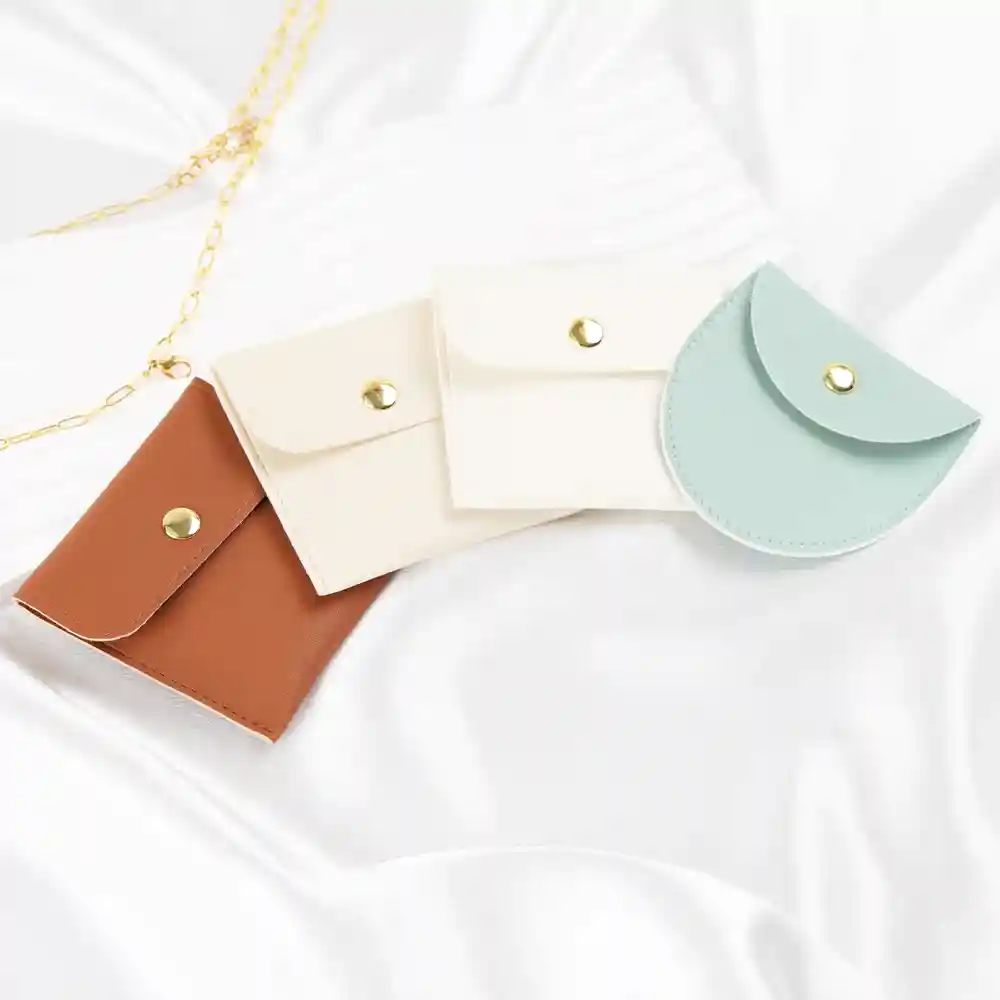 Pastel jewelry pouches with snap closures